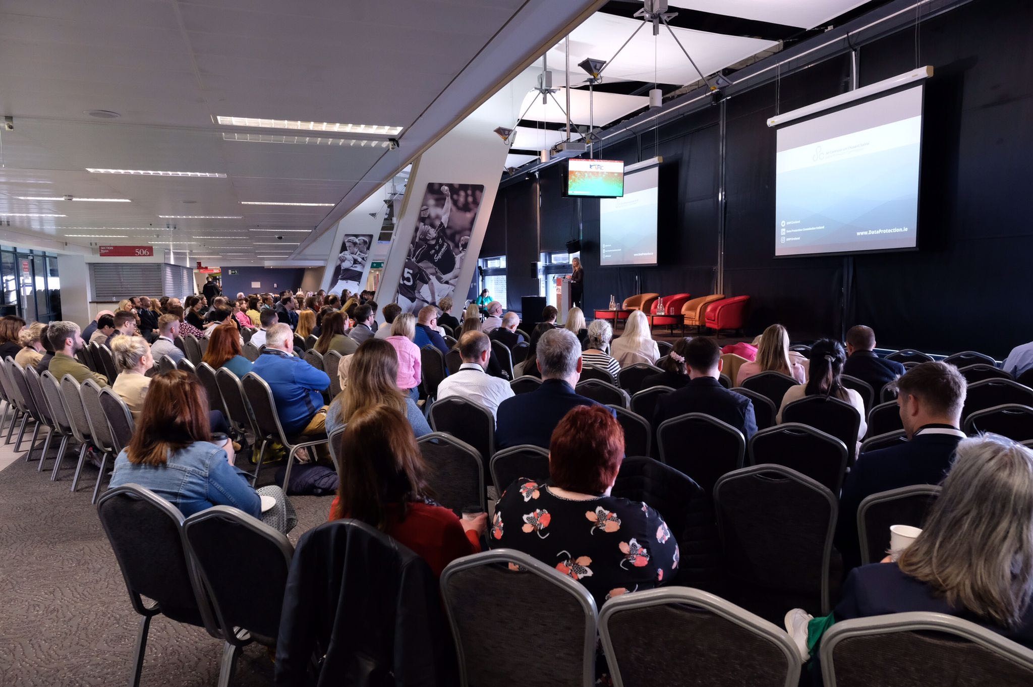 Delegates beginning to fill up the room on the morning of the Conference.